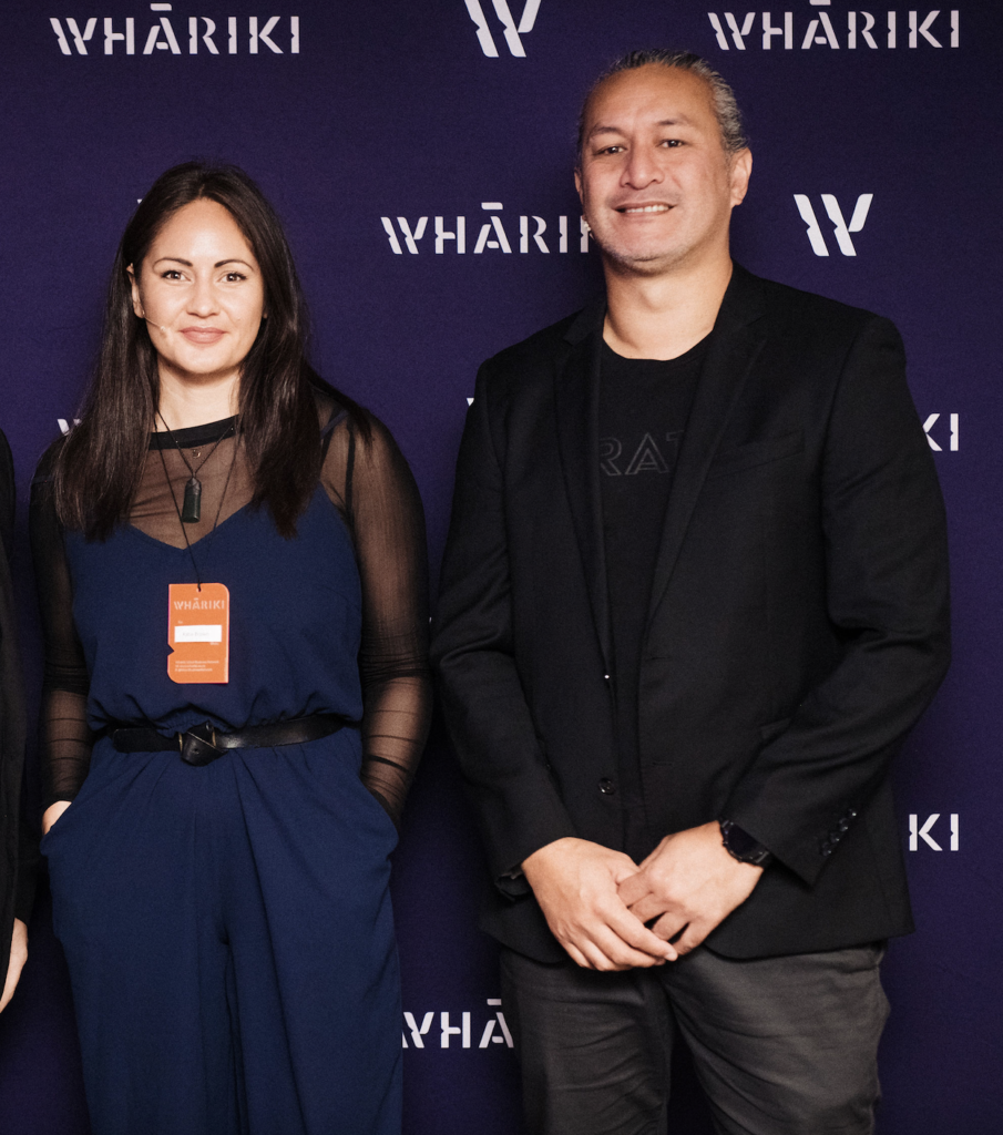 Three people, Katie Brown and Lee Timutimu standing in front of a purple background with the Whāriki logo.